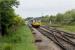 142028 on a Colne to Blackpool South service departs westwards from Bamber Bridge towards Lostock Hall on 23 May 2009. The train is approaching the former Bamber Bridge Junction on the line (to the right) to Preston via Todd Lane. Extensive engineers sidings on the right are currently out of use.<br><br>[John McIntyre 23/05/2009]