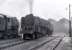 Scene at Kingmoor in 1967...in the rain. BR Standard class 9F 2-10-0 no 92208 stands in the yard.<br>
<br><br>[Colin Miller //1967]