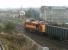 EWS 37716 weaves across tracks leaving Bradford Interchange on 1 April 1998 after running round the 'European Metal Recycling' Laisterdyke - Liverpool Alexandra Dock scrap working [See Image 27023]. After taking a right towards Mill Lane box, passing the lines turning left to New Pudsey and Leeds, it will take the straight ahead route to Halifax and the Calder Valley route west. <br><br>[David Pesterfield 01/04/1998]