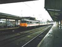 86 244 <I>Royal British Legion</I> pulls into Carlisle with a southbound train in October 1998<br><br>[David Panton /10/1998]