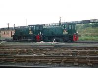 A pair of NBL diesel-hydraulic shunters nos D2728 and D2722 standing idle at the St Margarets outpost of Leith South in 1958. The mineral wagons in the background are on the embankment that carried the former Caledonian route from the eastern docks up to the bridge over Seafield Road.  <br><br>[A Snapper (Courtesy Bruce McCartney) //1958]