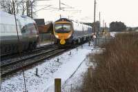 A southbound FTPE Class 185 bound for Manchester Airport passes a northbound Pendolino for Glasgow Central at the site of the former Brock station on 10 January 2010.<br><br>[John McIntyre 10/01/2010]