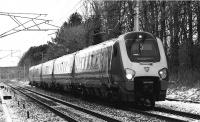 With the loss of the sun for the day, the camera was switched to Black & White mode to capture a Virgin Voyager southbound approaching Brock with a service to Birmingham New Street on a cold 10 January 2010 made even colder with a strong north easterly wind.<br><br>[John McIntyre 10/01/2010]