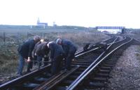 Not many more years of track maintenance to be done at Fraserburgh, as a PW gang gets on with the task in hand in late 1974, five years before complete closure.<br><br>[David Spaven //1974]