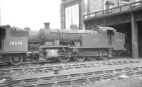 The yard at 72A Exmouth Junction in the summer of 1961. The tall building in the background is the repair shop. 30954 is a Southern Railway Maunsell Z Class 0-8-0T which was used for banking purposes between Exeter St. Davids and Exeter Central. Exmouth Junction shed closed in 1965.<br><br>[K A Gray 18/08/1961]