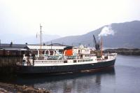 Plenty of goods vans and an operational steam crane in evidence at Kyle of Lochalsh in the summer of 1966 as <I>Loch Seaforth</I> calls en route from Mallaig to Stornoway.<br><br>[Frank Spaven Collection (Courtesy David Spaven) //1966]