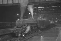A cold, wet September afternoon at Princes Street station in 1965 sees Black 5 no 44700 preparing to work its way home with the 9.5 pm to Carstairs.<br><br>[K A Gray 03/09/1965]