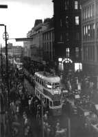 A Coronation Mark II tram, aka <I>Cunarder</I> photographed on 4 September 1962 passing along Jamaica Street during Glasgow's <I>Last Tram Procession</I>.<br>
<br><br>[Colin Miller 04/09/1962]