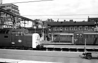 Scene at Kings Cross on 27 June 1978 with Deltic 55013 <I>The Black Watch</I> leaving the platforms and a pair of 31s acting as station pilots. <br><br>[Peter Todd 27/06/1978]