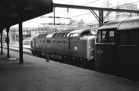 Deltic no 55003 <I>Meld</I>, at the head of an ECML service, standing alongside 31405 on empty stock duty at Kings Cross on 27 June 1978<br><br>[Peter Todd 27/06/1978]