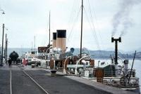 The <I>Duchess of Montrose</I> at the Gourock Pier fuelling berth in 1964 with an oil tank stabled in the siding on the quayside. Note members of the public happily wandering amongst the clutter.<br><br>[Colin Miller //1964]