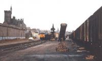 A dull and overcast day at Fraserburgh in 1974 as a Class 24 shunts coal and van traffic for Aberdeen.<br><br>[Frank Spaven Collection (Courtesy David Spaven) //1974]