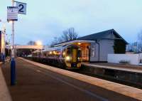 Dusk at Inverkeithing station on 30 January as 158 726 calls on a returning Fife local. Hard behind the platform the deep Keithing Burn slips by so quietly that, even in the silence following a departed train, you wouldn't know it was there. <br>
<br><br>[David Panton 30/01/2010]