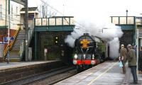 For just a brief moment, surprised commuters at Leyland on 4 February think their service to Liverpool has been upgraded, when 60163 <I>Tornado</I> appears with the Royal Train on its way to Manchester.<br><br>[John McIntyre 04/02/2010]