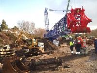 Scene alongside Carrbridge station on 12 February 2010, showing part of the 1000 tonne crane being assembled in readiness for 'the big lift'. <br><br>[Gus Carnegie 12/02/2010]