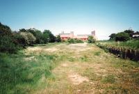 The station site at Gullane in June 1995, looking towards buffer stops. The branch had lost its passenger service as long ago as 1932, but remained open for freight until 1964. The site was redeveloped shortly after the photograph was taken and is now a housing estate.<br><br>[David Panton /06/1995]