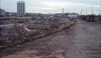 The derelict remains of Dundee Tay Bridge Goods looking east with the station off to the left. The site is now obliterated under the re-aligned A85, a nearby supermarket and car parks.<br><br>[Ewan Crawford 18/01/1989]