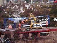 Some of the remaining badly damaged containers being cut up at Carrbridge on 14 February 2010.<br><br>[Gus Carnegie 14/02/2010]