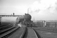 V2 2-6-2 no 60886 photographed shortly after reversing off Gateshead shed and onto the King Edward Bridge in the 1960s, having travelled via King Edward Bridge East Junction off to the right. The locomotive is about to cross the Tyne to reach Newcastle Central station. The triangular set of junctions here is completed by King Edward Bridge West Junction behind the camera.<br><br>[K A Gray //]