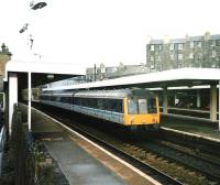 117 313 at Haymarket platform 2 with a Cowdenbeath service on 1 March 1999<br><br>[David Panton 01/03/1999]