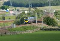 A southbound First TransPennine Express service for Manchester Airport running south parallel with the M74 towards Beattock Summit from Elvanfoot on 1 June 2009 <br>
<br><br>[John McIntyre 01/06/2009]