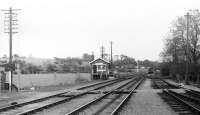 Looking east, towards Bedale, from the end of Leyburn station platform on the eve of closure of the goods yard facilities. The signal box shown here was demolished and the pointwork removed after the yard closed although a plain line remained in place for the Redmire traffic that continued for some years. [See image 19458] for the view in the opposite direction on the same day. <br><br>[Mark Bartlett 27/05/1982]