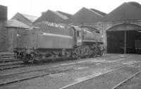 BR Standard class 4 2-6-0 no 76000 stands outside Motherwell shed c 1966.<br><br>[K A Gray //1966]
