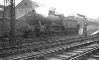 Gresley K2 no 61764 <I>Loch Arkaig</I> southbound on the up goods line through Springburn in July 1961. The K2 is taking a ballast train towards Sighthill Junction. The North British Locomotive Co Hyde Park works stands in the background. <br><br>[K A Gray 03/07/1961]