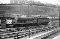 Scott class 4-4-0 no 62422 <I>Caleb Balderstone</I> in the yard at Hawick on 12 April 1958. The locomotive was withdrawn from Hawick shed at the end of that year.<br><br>[Robin Barbour Collection (Courtesy Bruce McCartney) 12/04/1958]