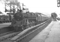 BR Caprotti standard class 5 4-6-0 no 73149 gets ready to leave Glasgow's Buchanan Street station in 1964 with a train for Dundee.<br><br>[K A Gray //1964]
