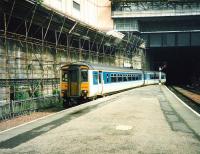 156 495 pulls into Platform 1 at Glasgow Queen Street during the construction of the Buchanan Galleries shopping mall in July 1998.<br><br>[David Panton /07/1998]