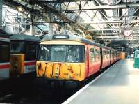 303 025 at Glasgow Central in June 1997 with a Cathcart Lines service.<br><br>[David Panton 02/06/1997]