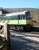 First train of the day from Pickering, hauled by D7628, waits at the level crossing at Levisham on a fine spring morning in April 2009, before continuing its journey north with a service for Grosmont.<br><br>[John Furnevel 20/04/2009]