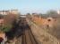 There is little trace these days of the four tracks that used to pass through Ansdell and Fairhaven, the houses on the right of this picture having been built on the old trackbed. This view looks west from a modern footbridge and the remaining face of the island platform can be seen beyond the road bridge. Unfortunately the scheduled service to Blackpool South did not appear for the picture. <br><br>[Mark Bartlett 22/02/2010]