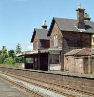 Thornhill station still retained its canopy in 1989 and had a 'just closed' feel to it despite its closure to passengers in 1965. The stonework has since been painted red and the building rennovated.<br><br>[Ewan Crawford //1989]