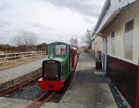 Pre-season works train on the Isle of Mull Railway. <I>Frances</I>, new to the railway in 2000, stands at Craignure with a coach and open wagon servicing a working party getting ready for the start of 2010 services on 1st April. <I>Frances</I> may look tiny but weighs in at around two tons. View towards Torosay. <br><br>[Mark Bartlett 23/03/2010]