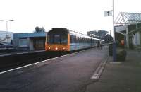 Twilight in September 1998 and 117 301 calls at Kirkcaldy with a returning Outer Circle service, the 1757 from Waverley.  This was a pretty certain 117 diagram among all those 150s (of blessed memory). <br><br>[David Panton /09/1998]