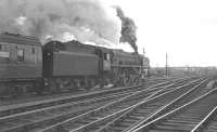 Britannia Pacific no 70044 <I>Earl Haig</I> takes the 12.05 Glasgow Central - Birmingham New Street out of Carlisle in April 1963.<br><br>[K A Gray 12/04/1963]