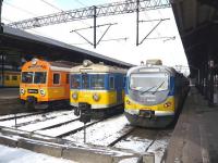 Three colourful generations of EMU stand at the buffer stops at Gdansk Glowny station in March 2010.<br>
<br><br>[Colin Miller 08/03/2010]