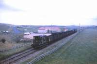 With a reasonable load in tow, a Class 24 heads the daily goods away from Fraserburgh in late 1974, five years before closure. <br><br>[David Spaven //1974]