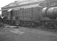 Prototype BR mixed-traffic diesel-electric locomotive no 10800 in a siding at Derby Works on 27 August 1960. NBL built 10800 was ordered by the LMS in 1946 but did not appear until 1950 following nationalisation. Intended as a replacement for steam on secondary branch lines (pre-Beeching) orders for a total of 54 similar locomotives were placed in 1955 (eventually becoming the short-lived BR classes 15 and 16). [See image 2884]<br><br>[K A Gray 27/08/1960]