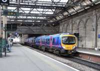 TransPennine 185 112 nearly ready to depart Platform 10 at Waverley on 24 March. Its journey to Manchester Airport will not conspicuously involve crossing the Pennines, though it will have a fair stab at the less celebrated Southern Uplands. <br>
<br><br>[David Panton 24/03/2010]