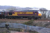 67009 climbs away from Inverkeithing with an unidentified train on 5 April, following some 15 minutes behind the scheduled Fife Circle service [See image 28383] .<br><br>[Bill Roberton 05/04/2010]