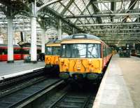 <I>Blue Trains</I> waiting at platforms 8 & 9 of Glasgow Central in July 1997<br><br>[David Panton /07/1997]
