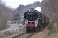 <I>The Great Britain III</I> approaching Pitlochry on 13 April 2010, with 61994 coupled 'inside' and the driver of 70013 whistling for the private level crossing.  <br><br>[Bill Roberton 13/04/2010]