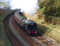 Scene at Kirkforthar Bridge on the northern approach to Markinch on 13 April with 70013 beating a steady exhaust as it climbs south to Lochmill Summit heading for Edinburgh with <I>The Great Britain III</I>.<br>
<br><br>[Brian Forbes 13/04/2010]