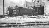 An August 1960 scene in the Welsh valleys with residents 5516 and 6644 standing outside 86C Aberbeeg shed.<br><br>[K A Gray 12/08/1960]