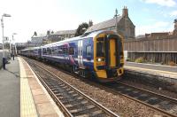 158735 runs into Kinghorn station on 15 April with a service to Glenrothes.<br><br>[John Steven 15/04/2010]