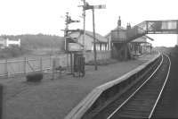 The station and goods shed at Douglas West, looking towards Muirkirk from a passing train in October 1964, the month the station closed.<br><br>[Colin Miller /10/1964]