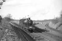 Class D34 4-4-0 no 62471 <I>Glen Falloch</I> approaching Kirkbank station on the Jedburgh branch with the BLS <i>Scott Country Railtour</i> on 4 April 1959.<br><br>[Robin Barbour Collection (Courtesy Bruce McCartney) 04/04/1959]